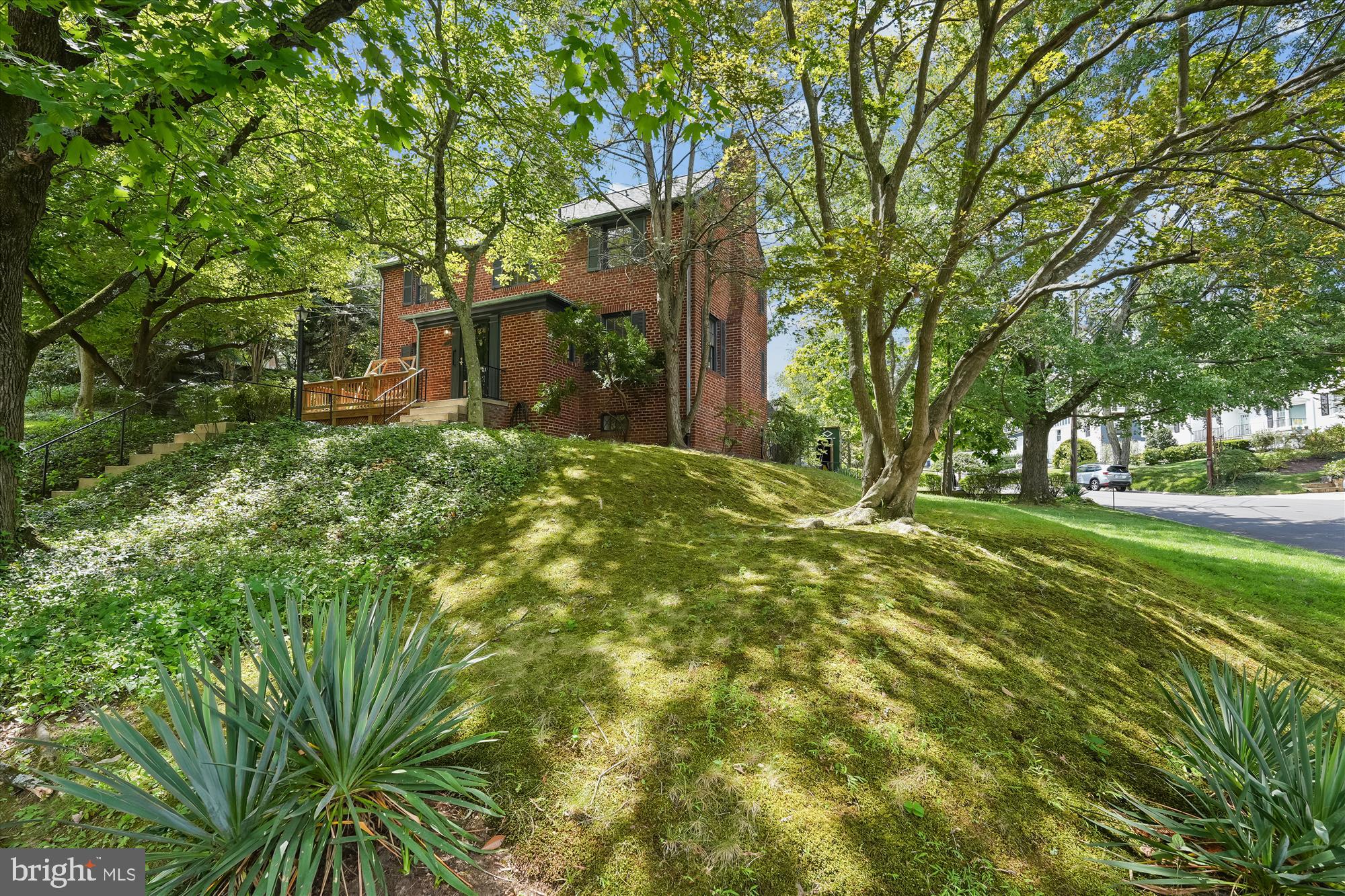 7206 Pinehurst Parkway Chevy Chase, MD 20815 - Photo 48 of 56 a backyard of a house with lots of green space