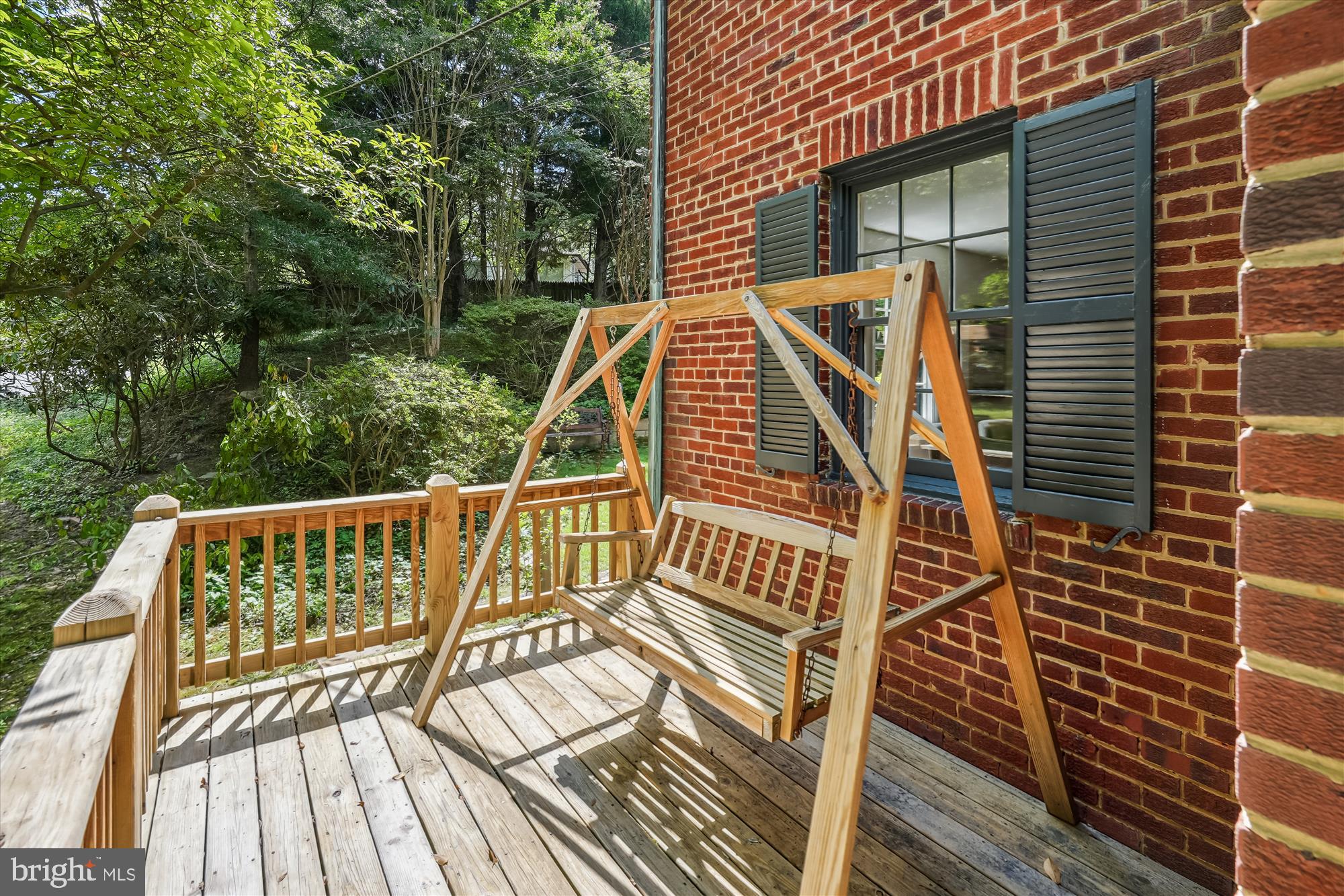 7206 Pinehurst Parkway Chevy Chase, MD 20815 - Photo 51 of 56 a view of balcony with wooden floor and fence