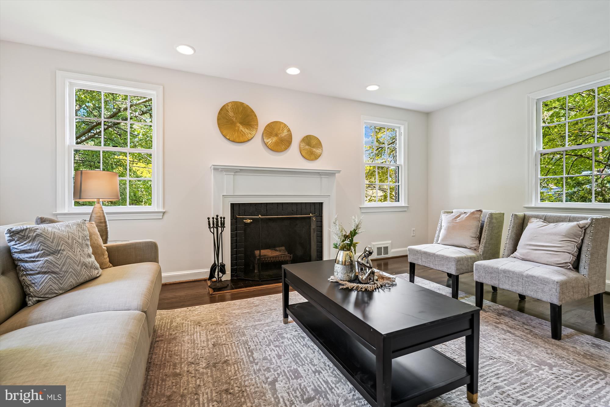 7206 Pinehurst Parkway Chevy Chase, MD 20815 - Photo 7 of 56 a living room with furniture and a fireplace