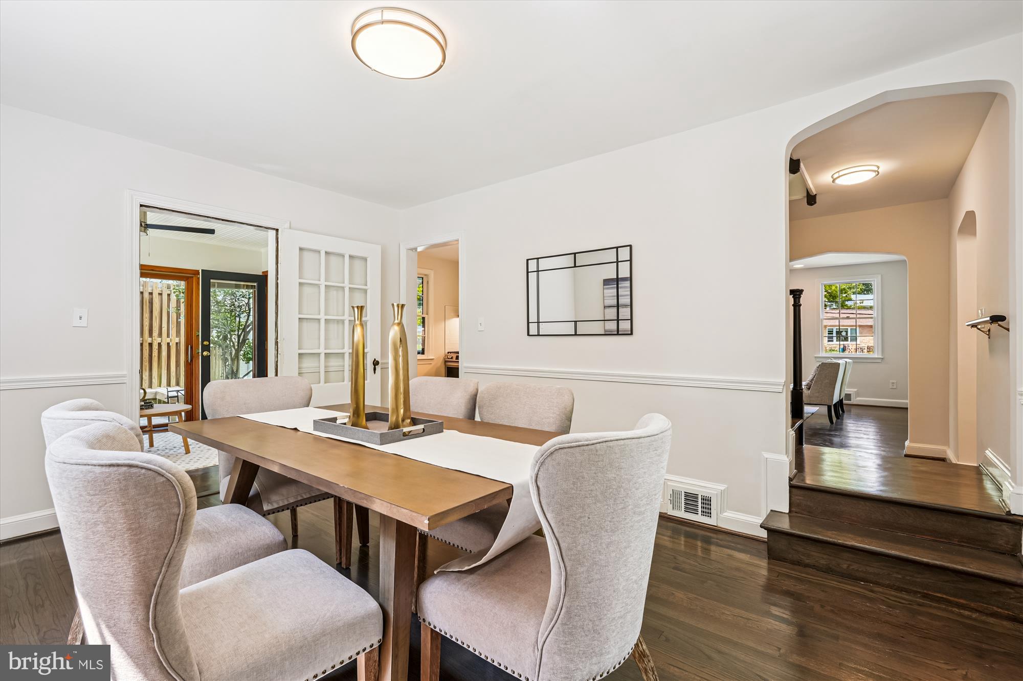 7206 Pinehurst Parkway Chevy Chase, MD 20815 - Photo 9 of 56 a view of a dining room with furniture window and wooden floor