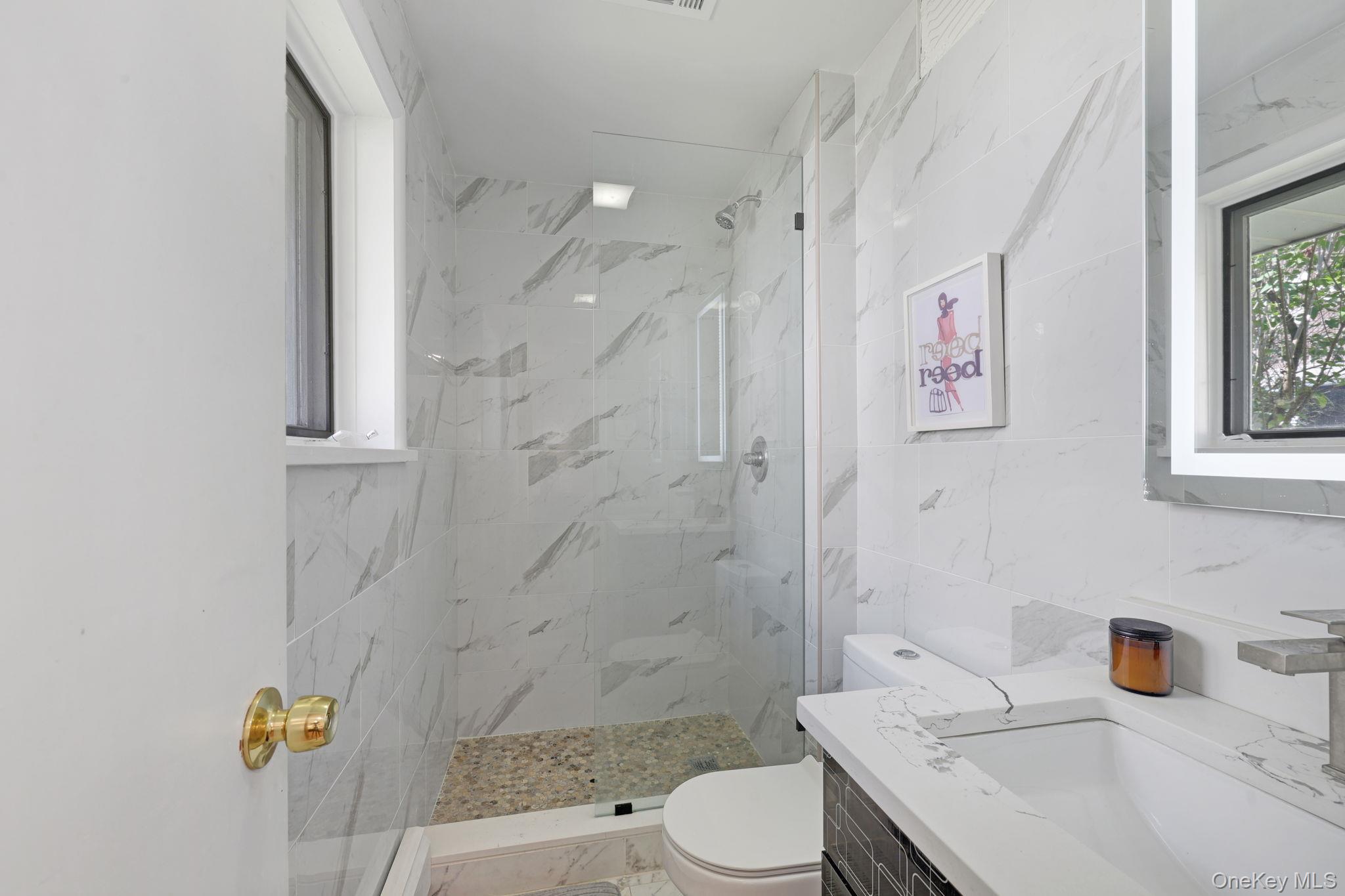 35 Kroeger Road Monticello, NY 12701 - Photo 15 of 29 a bathroom with a sink toilet and shower