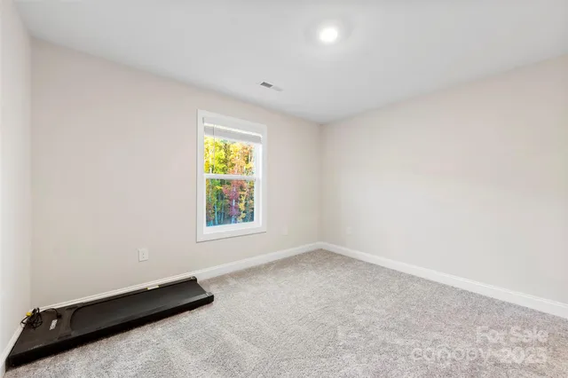 an empty room with window