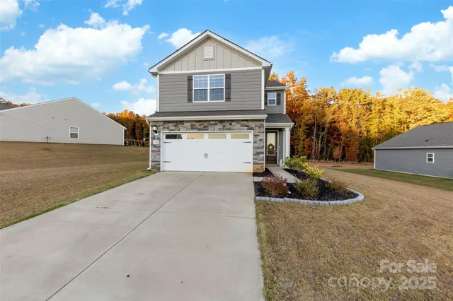 a front view of house with yard