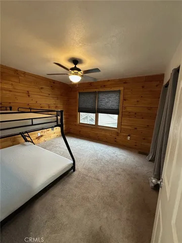 a view of a livingroom with a staircase