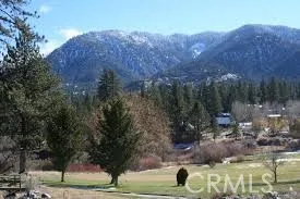 a view of a lake with mountain