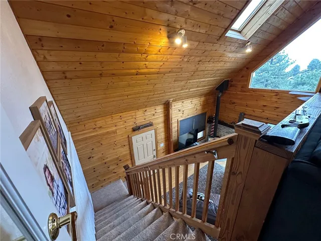 a view of deck with wooden floor and outdoor seating