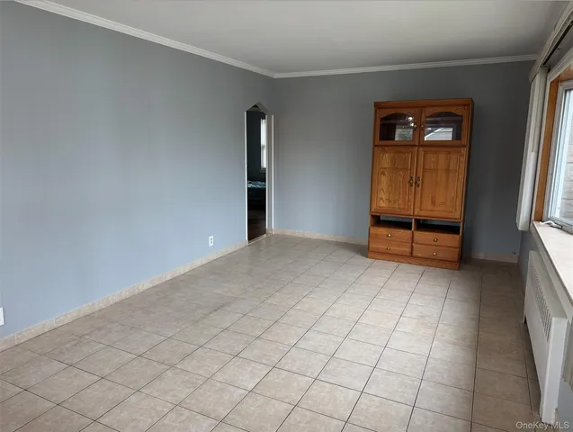 a bathroom with a sink a bathtub and a mirror