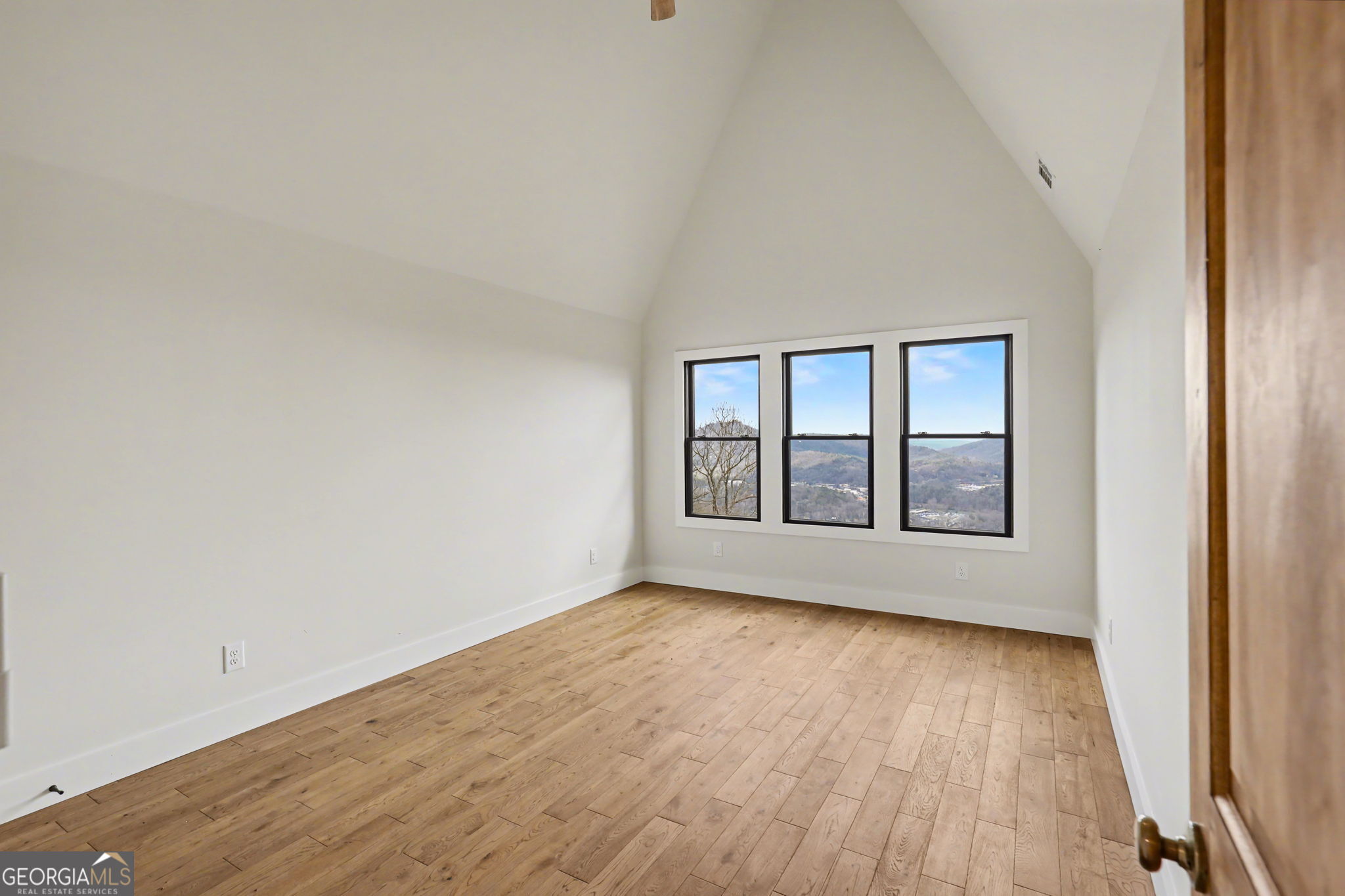 416 Winding View Clayton, GA 30525 - Photo 46 of 61 wooden floor in an empty room with a window