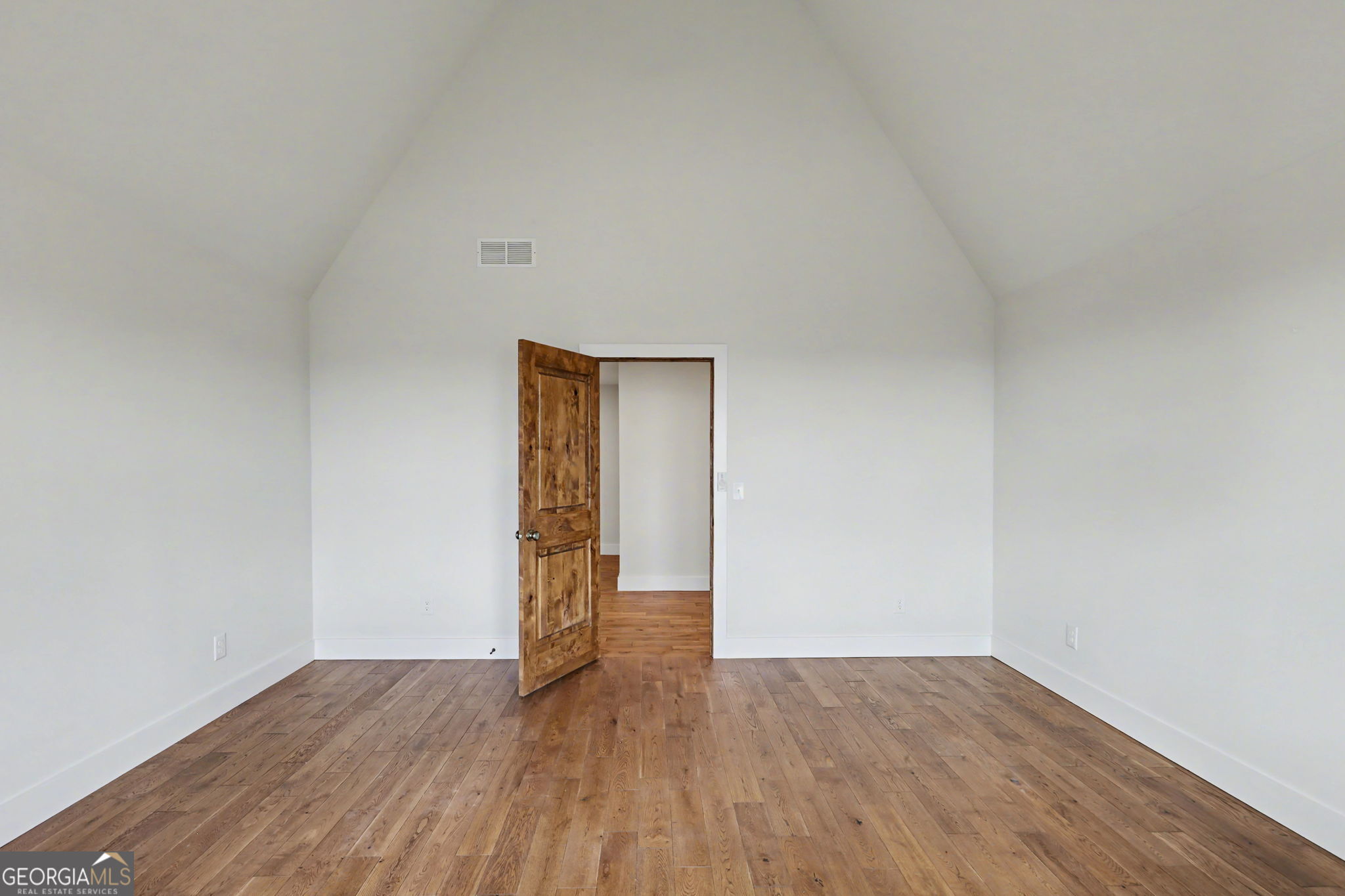 416 Winding View Clayton, GA 30525 - Photo 47 of 61 a view of an empty room and wooden floor