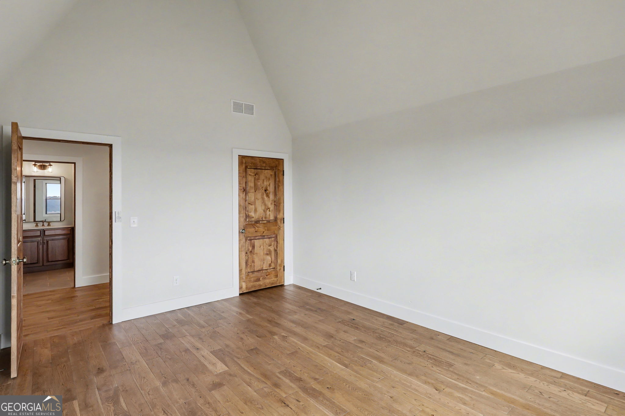 416 Winding View Clayton, GA 30525 - Photo 50 of 61 a view of an empty room and wooden floor