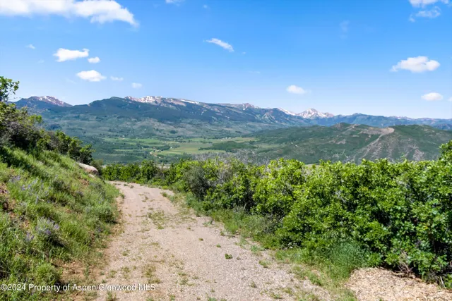 a view of a lake with a mountain