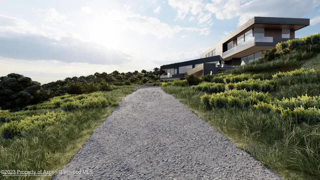 a view of a garden with a house