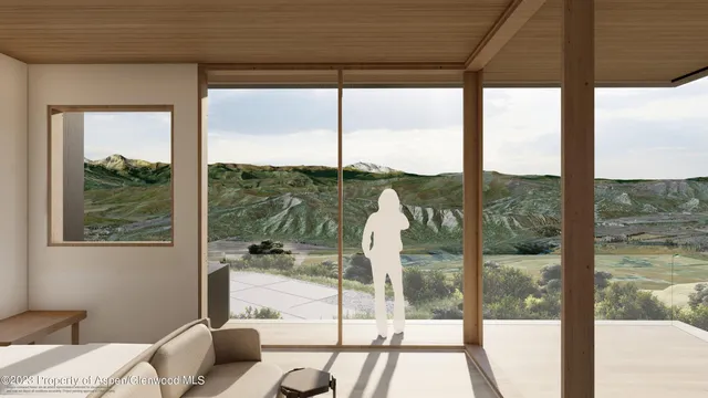 a view of a room that has a bed