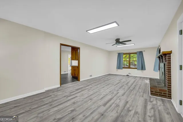 an empty room with window