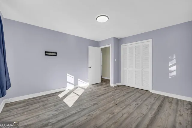 a backyard of a house with trees