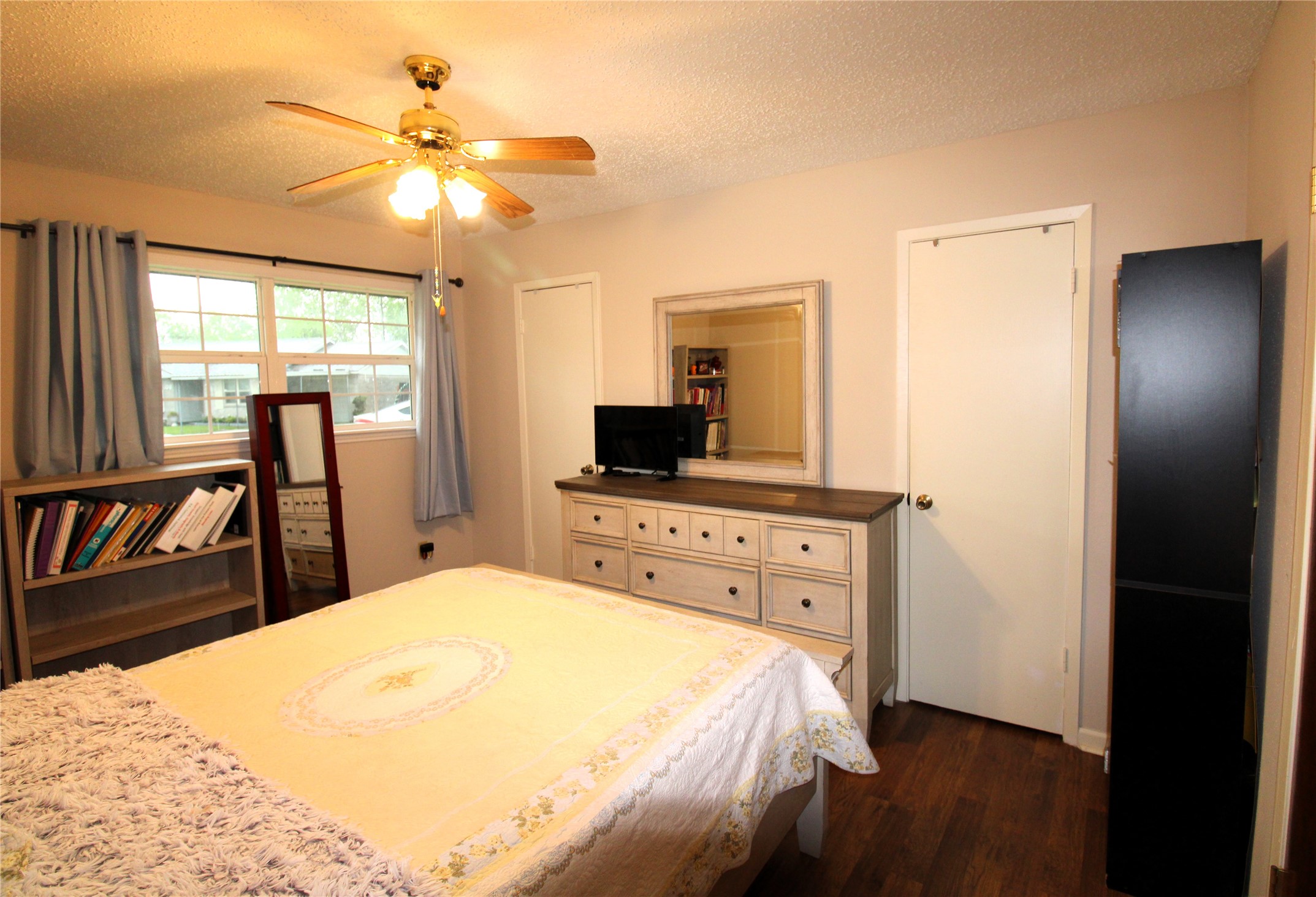 303 North 9th Street Beasley, TX 77417 - Photo 30 of 41 Large window to front of home and neutral colors!