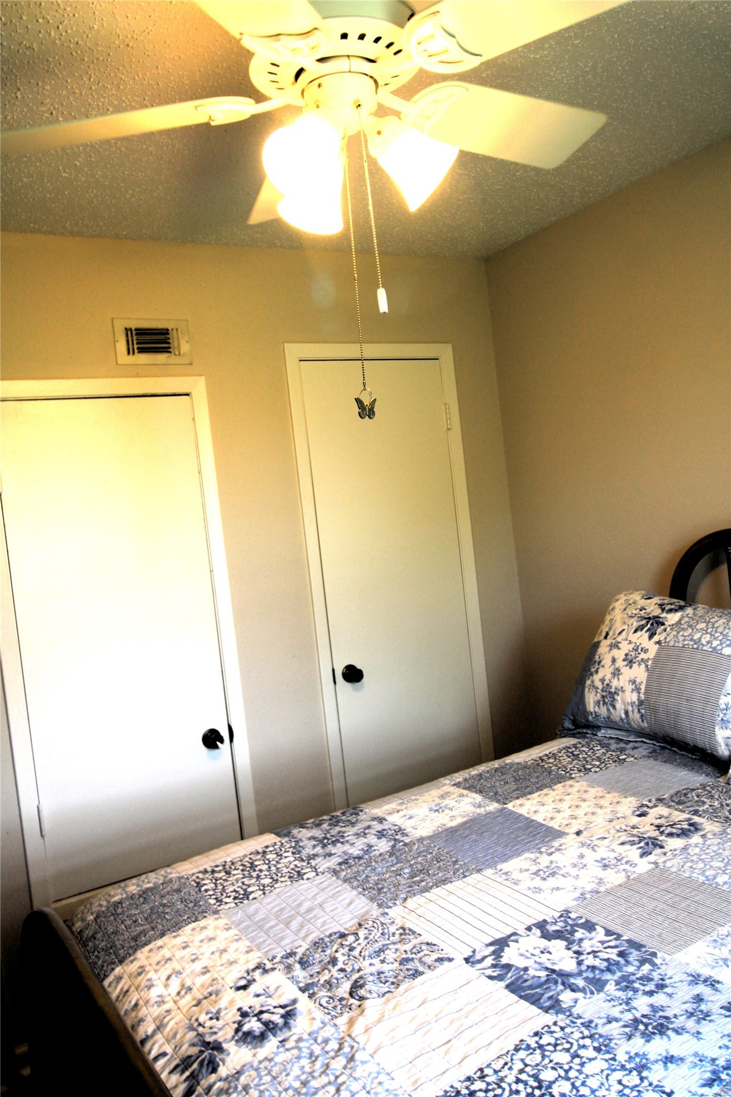 303 North 9th Street Beasley, TX 77417 - Photo 37 of 41 Cozy bedroom shows closet and room for queen sized bed!
