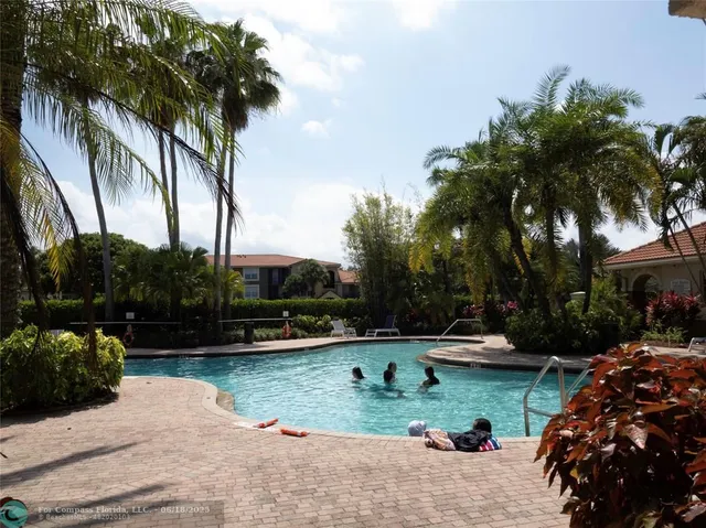 a row of palm trees and a park