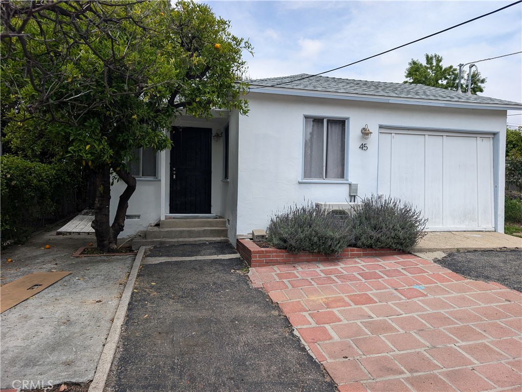 a house view with a outdoor space