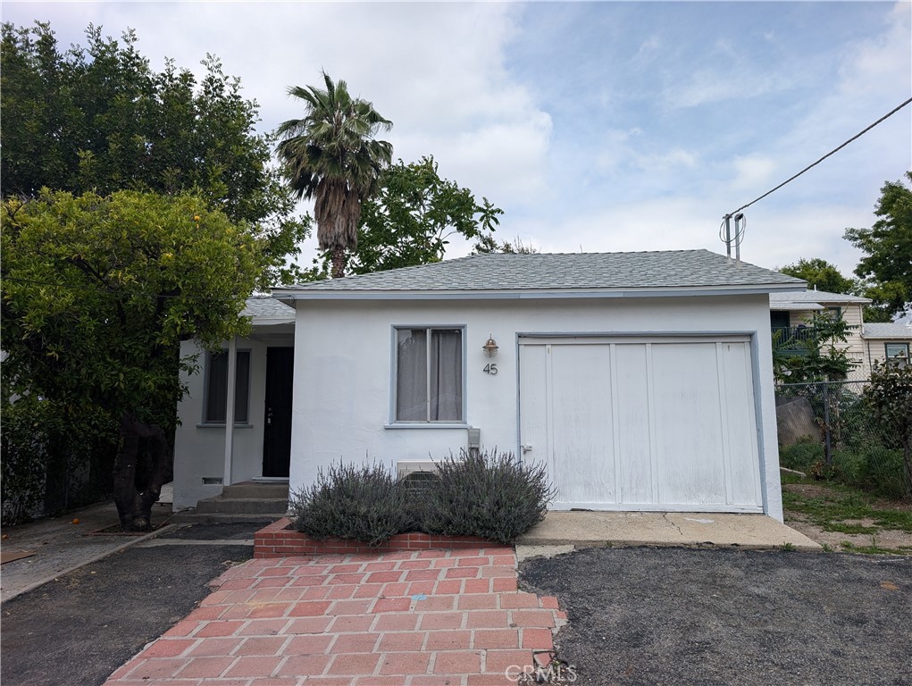 45 West Washington Boulevard Pasadena, CA 91103 - Photo 2 of 7 a front view of house with yard and trees around