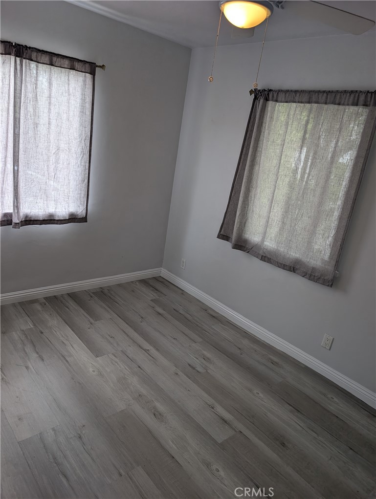 45 West Washington Boulevard Pasadena, CA 91103 - Photo 3 of 7 a view of a small space with wooden floor and window