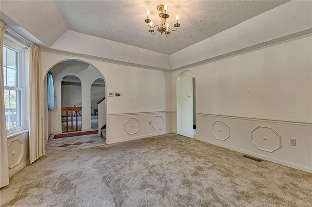 a view of a livingroom with a chandelier