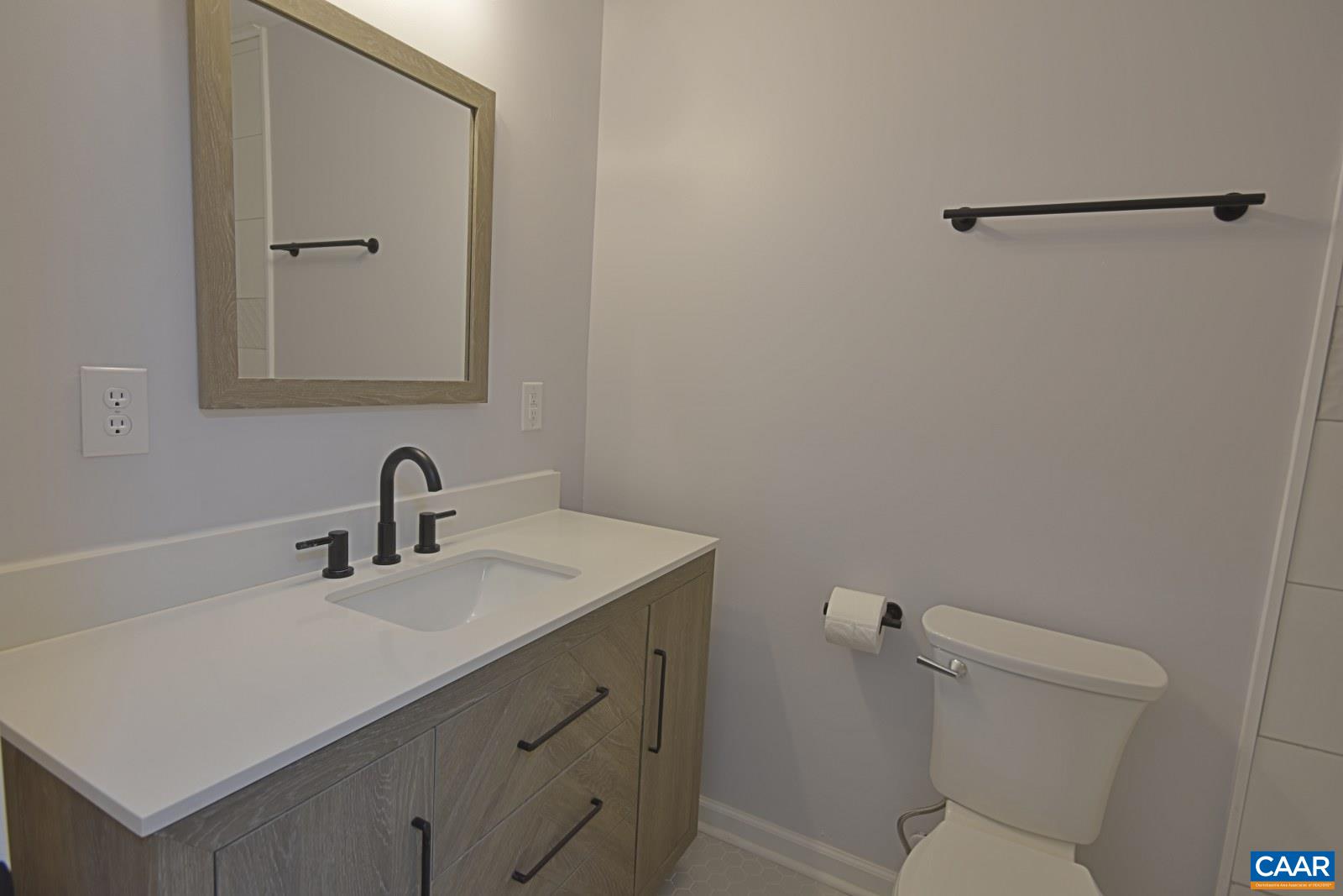 330 Brentwood Road Charlottesville, VA 22901 - Photo 16 of 26 a bathroom with a sink toilet and vanity