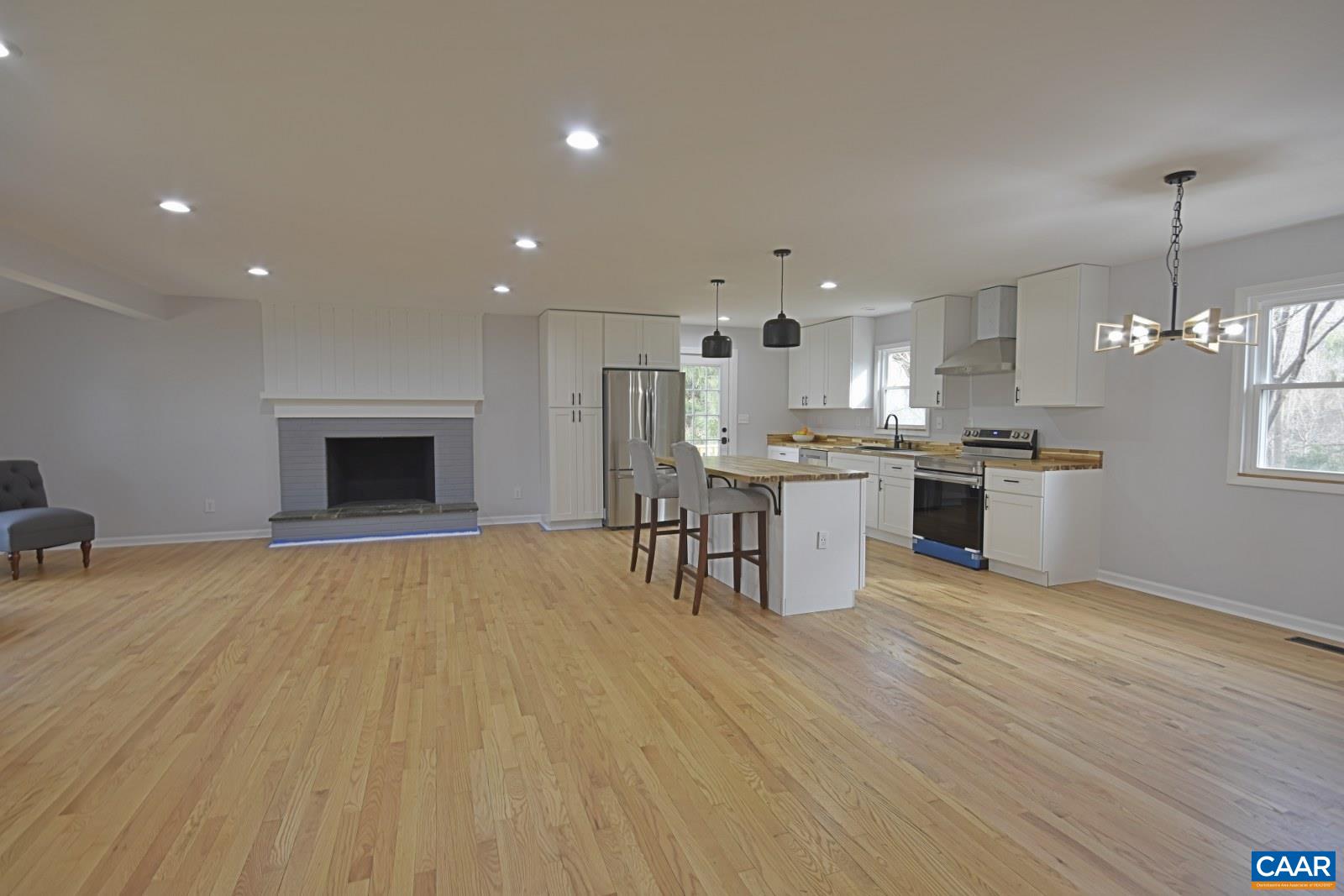 330 Brentwood Road Charlottesville, VA 22901 - Photo 2 of 26 an open kitchen with kitchen island and stainless steel appliances