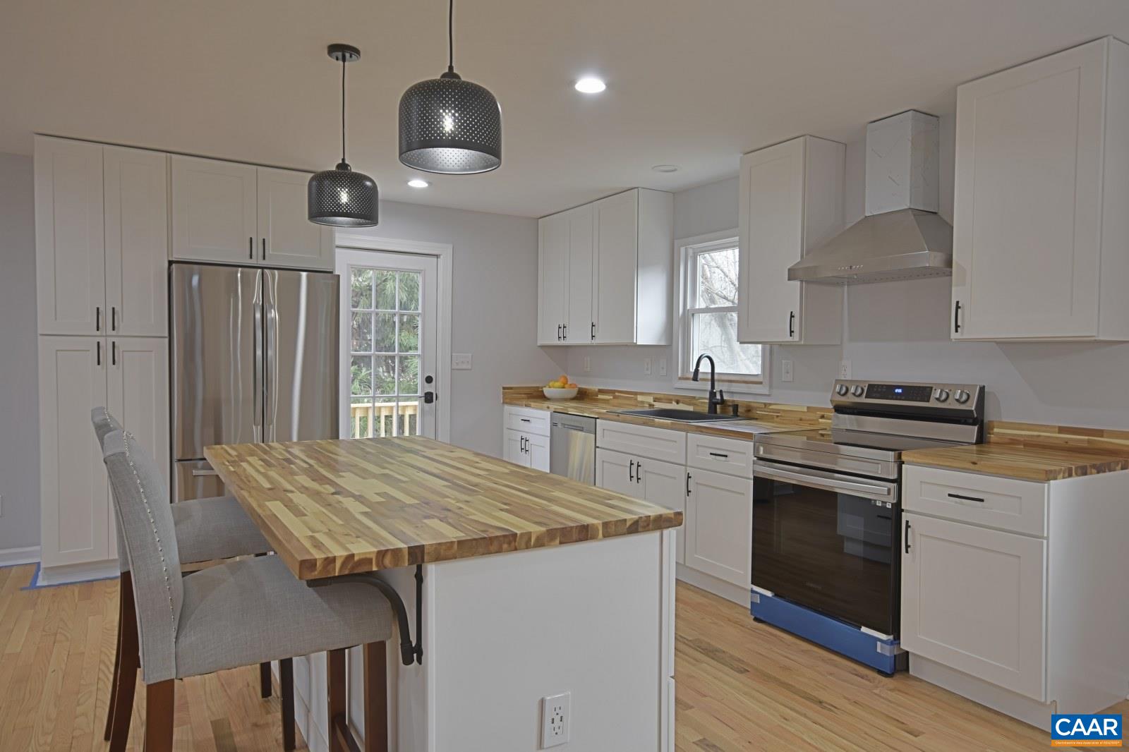 330 Brentwood Road Charlottesville, VA 22901 - Photo 4 of 26 a kitchen with granite countertop center island and stainless steel appliances