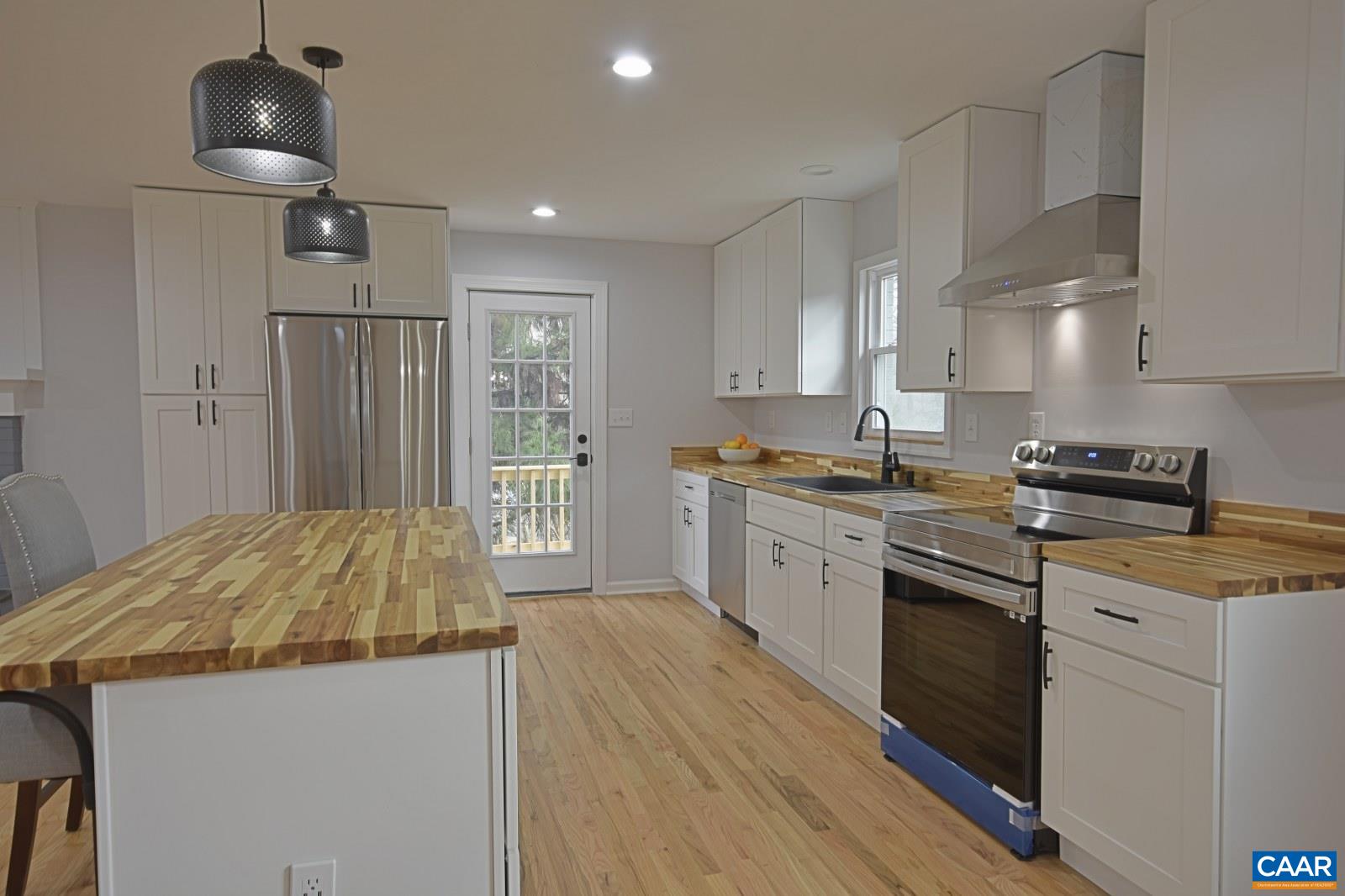 330 Brentwood Road Charlottesville, VA 22901 - Photo 8 of 26 a kitchen with stainless steel appliances granite countertop a sink stove and refrigerator