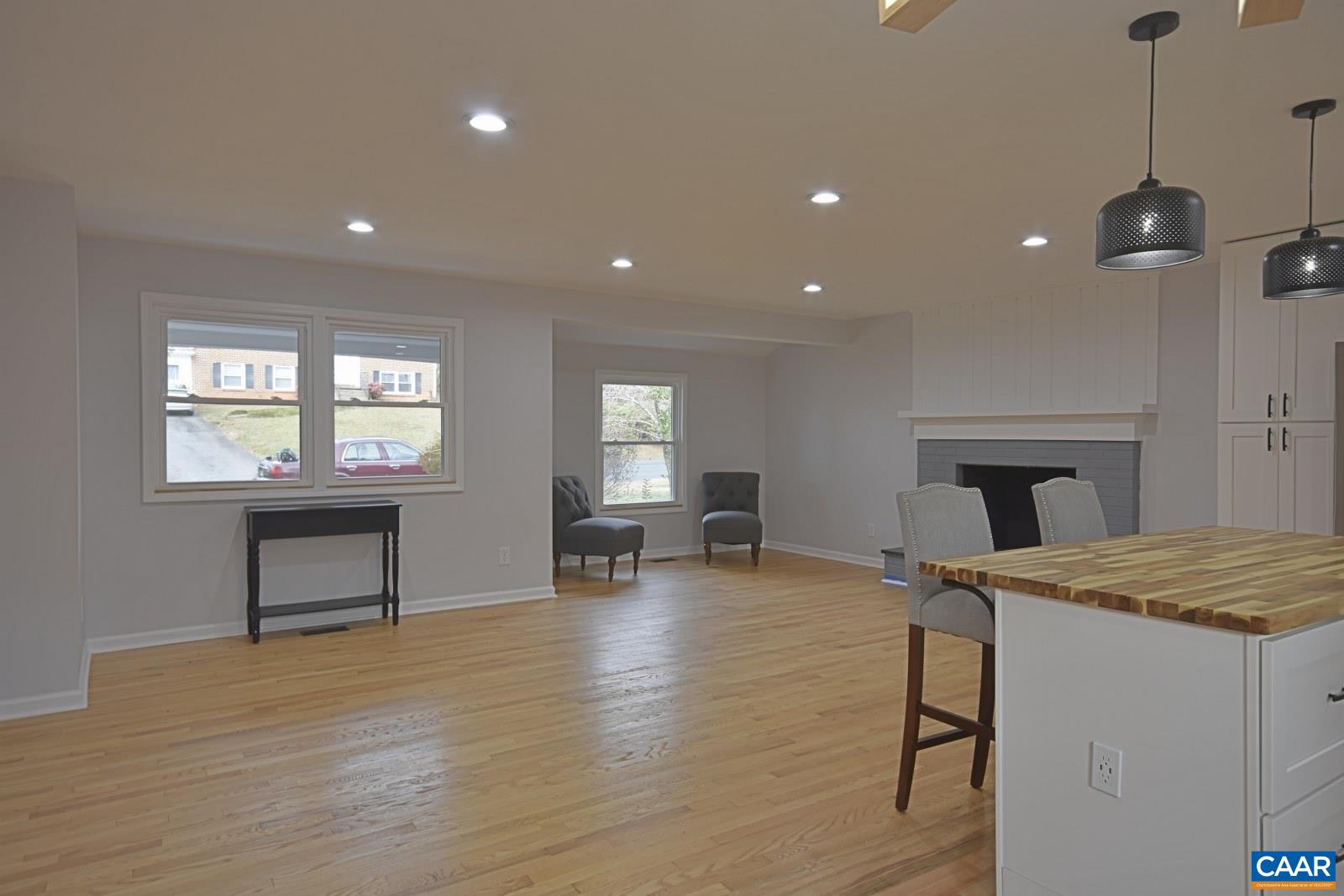 330 Brentwood Road Charlottesville, VA 22901 - Photo 9 of 26 a living room with furniture and a wooden floor