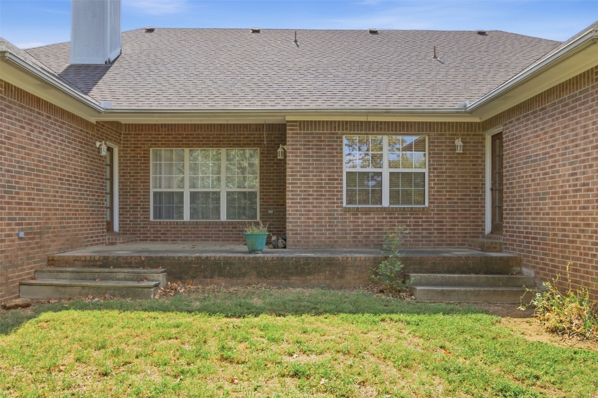 17875 East 589 Road Inola, OK 74036 - Photo 32 of 73 Brick exterior with a covered patio and concrete steps