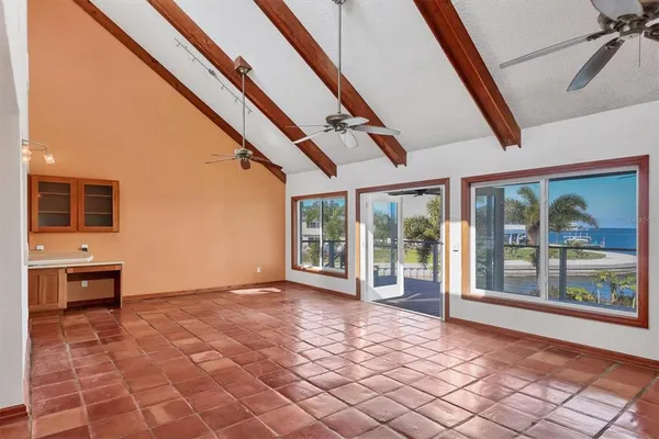 a view of an entryway with a floor to ceiling window