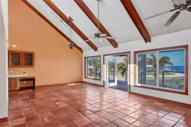 a view of an entryway with a floor to ceiling window