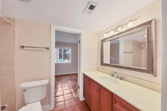 a view of a livingroom with furniture and a fireplace