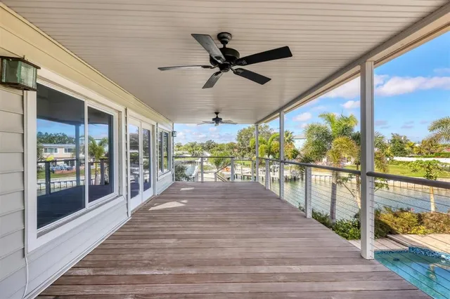 a potted plant sitting in front of a house