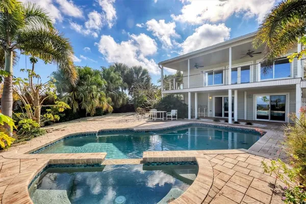 a view of a backyard with a garden