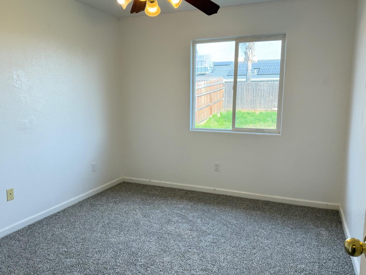 946 West Mammoth Pool Way Hanford, CA 93230 - Photo 6 of 17 an empty room with a window