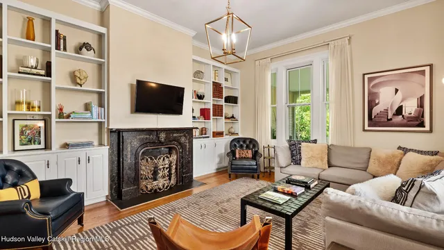a view of a livingroom with furniture and front door