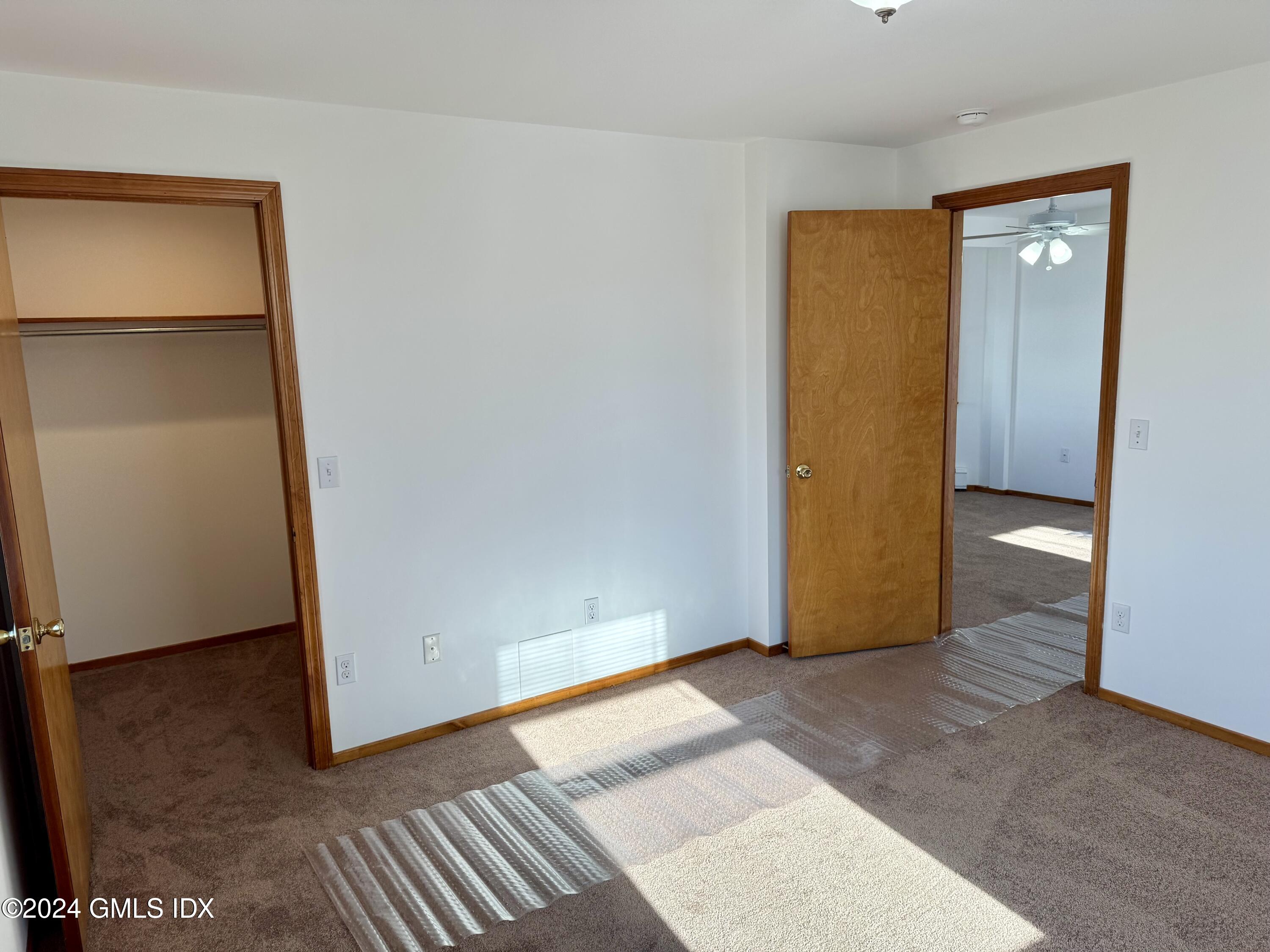 137 South Water Street, Unit 1B Greenwich, CT 06830 - Photo 6 of 13 an empty room with closet