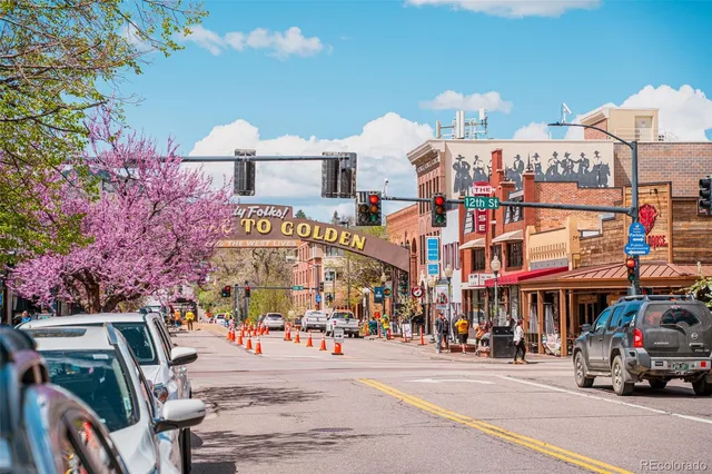 a store with flowers and view of store