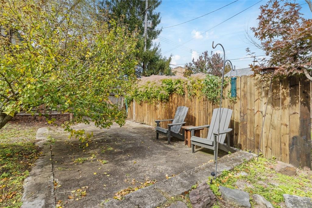1141 Chislett Street Pittsburgh, PA 15206 - Photo 24 of 34 a view of a backyard with chairs