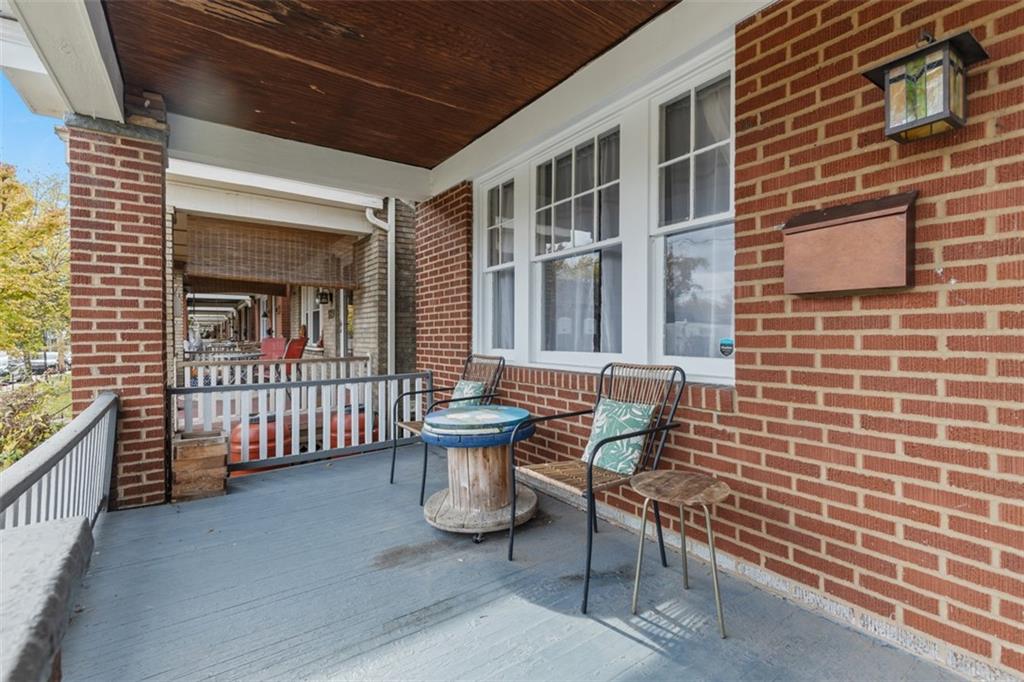 1141 Chislett Street Pittsburgh, PA 15206 - Photo 26 of 34 a view of front door of house with outdoor seating