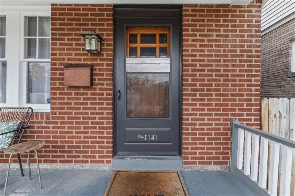 1141 Chislett Street Pittsburgh, PA 15206 - Photo 27 of 34 a view of front door of house and window