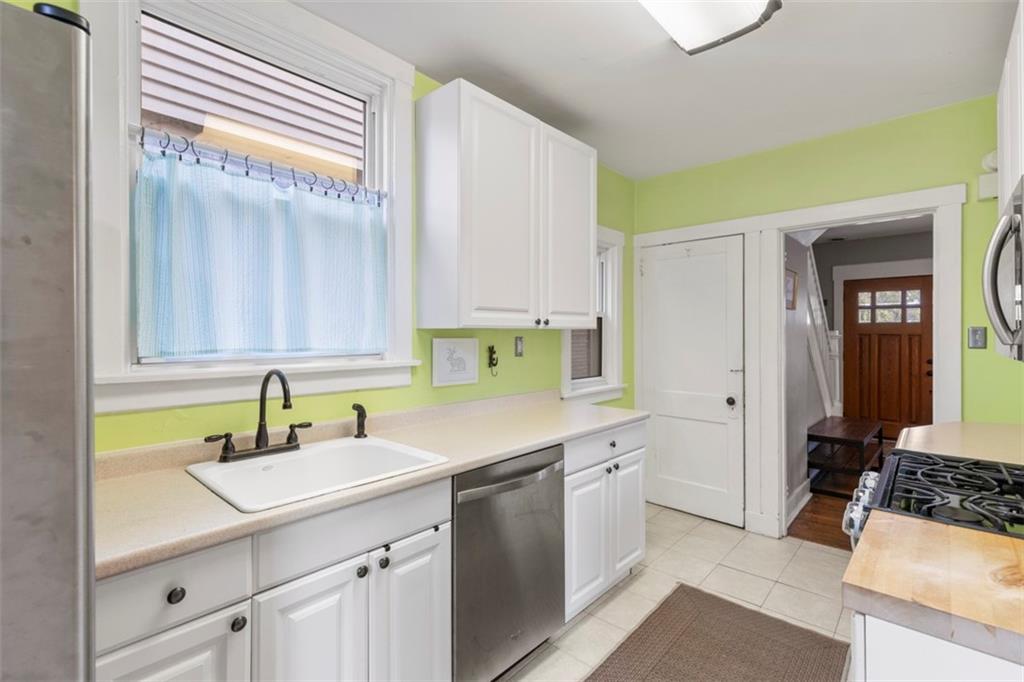 1141 Chislett Street Pittsburgh, PA 15206 - Photo 10 of 34 a kitchen with a sink and cabinets