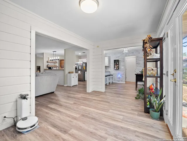 a view of a living room and entryway