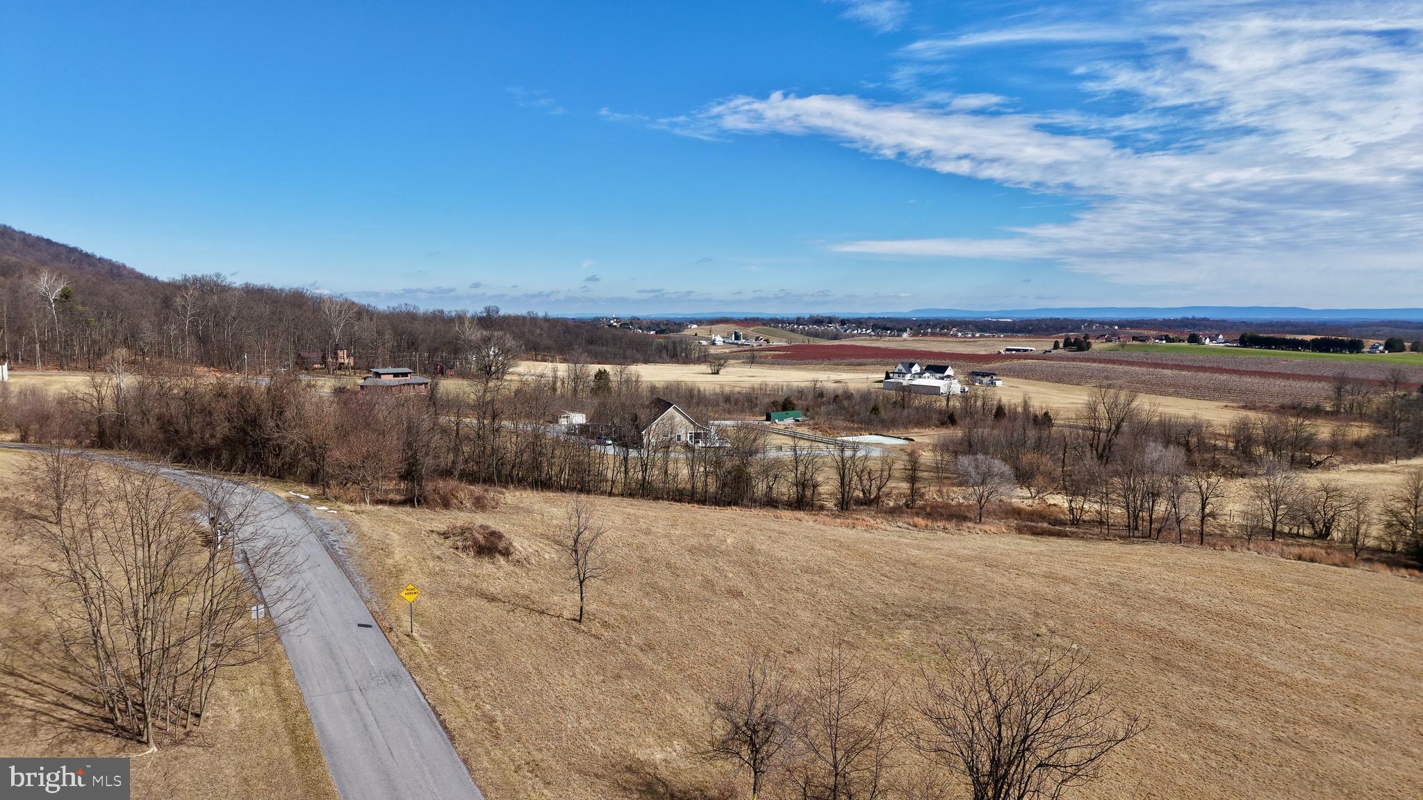 Lot 4 Galloway Road Martinsburg, WV 25403 - Photo 7 of 17 a view of a dry yard with wooden fence