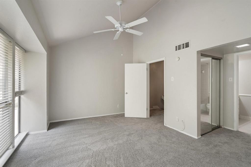 4543 North O'Connor Road, Unit 1247 Irving, TX 75062 - Photo 12 of 25 a view of an empty room with a ceiling fan