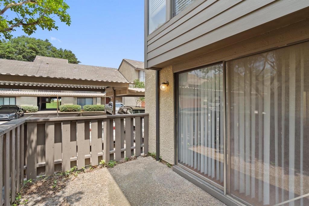 4543 North O'Connor Road, Unit 1247 Irving, TX 75062 - Photo 20 of 25 a view of wooden balcony