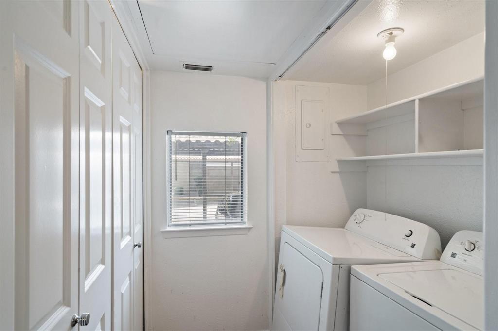 4543 North O'Connor Road, Unit 1247 Irving, TX 75062 - Photo 9 of 25 a view of storage and utility room with washer and dryer